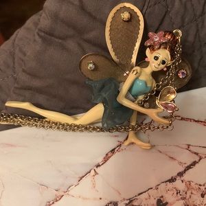 The Fairy necklace is 15” in length … missing 1 stone with tags moveable parts..